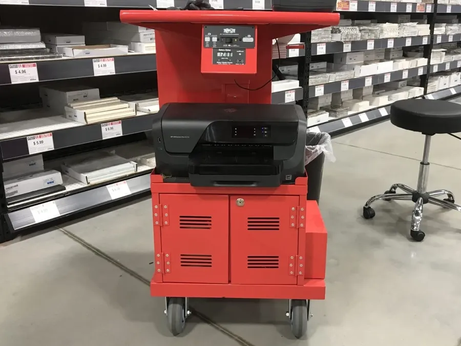 Custom fabricated inventory cart with welded steel shelving
